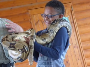 Fear Theme - Boy Holding Large Snake