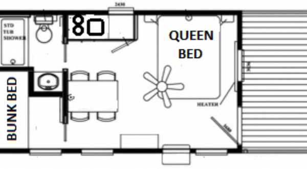 Cindy Bear ADA Cottage floorplan showing queen bedroom, bunk beds, kitchen, and accessible bathroom