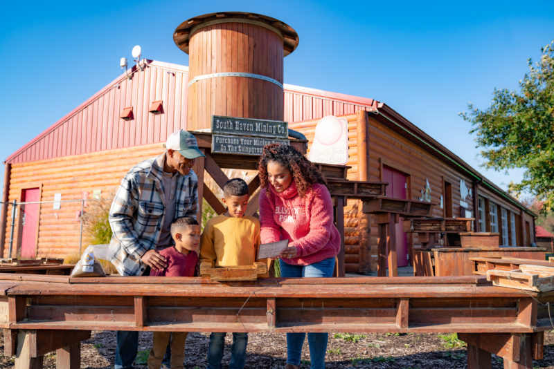 Old Faceful Mining Company at Jellystone Park™ South Haven Family panning for gems at Old Faceful Mining Company at Jellystone Park™ South Haven